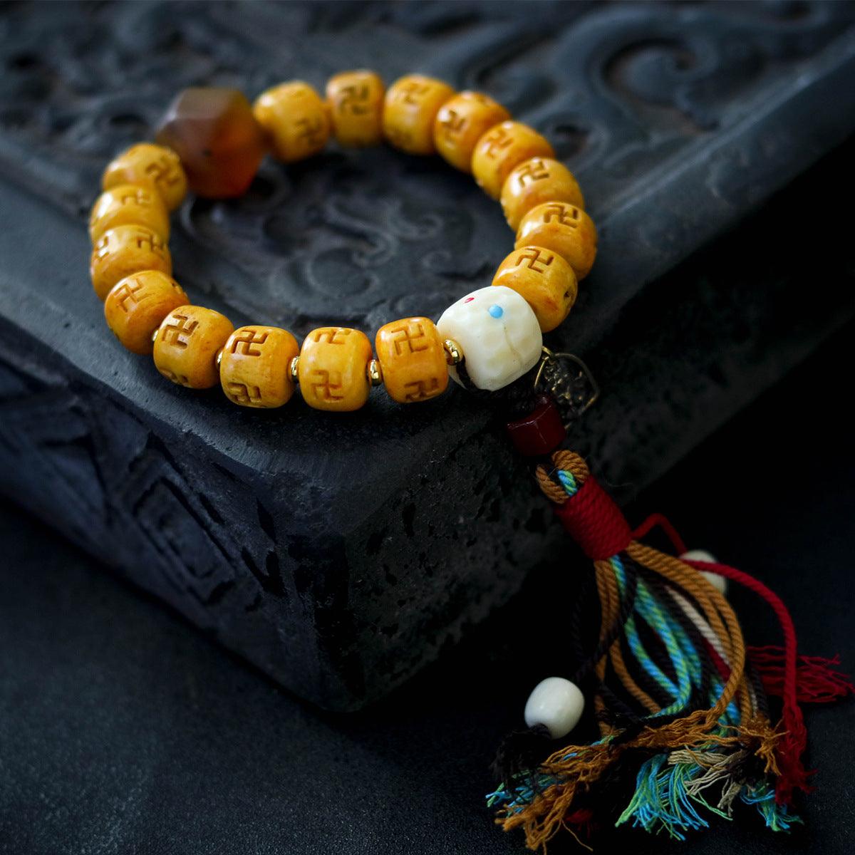 Tibetan-style Buddhist Cow Bone Carved Swastika Protective Bracelet