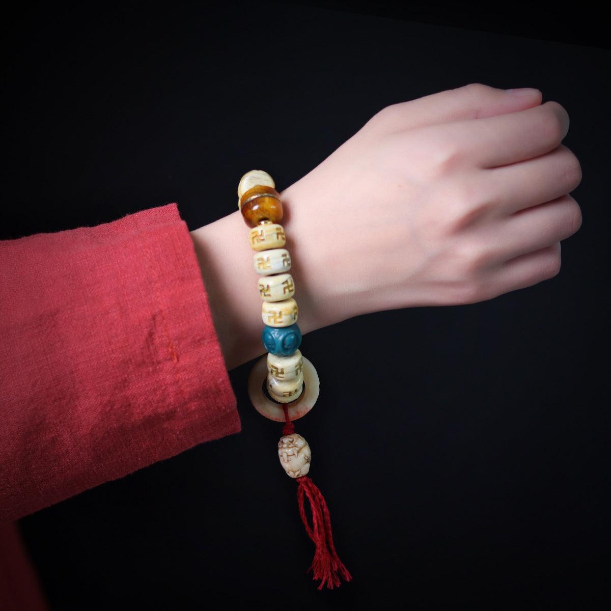 Tibetan-style Buddhist Cow Bone Carved Swastika Protective Bracelet