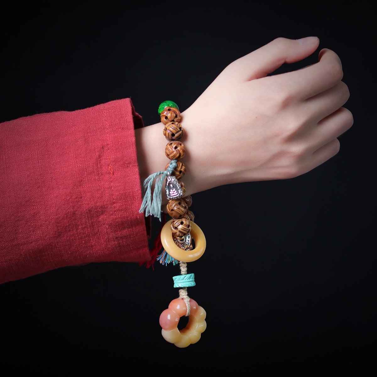 Tibetan-style Buddhist Cow Bone Hollow God Statue Protective & Luck Bracelet